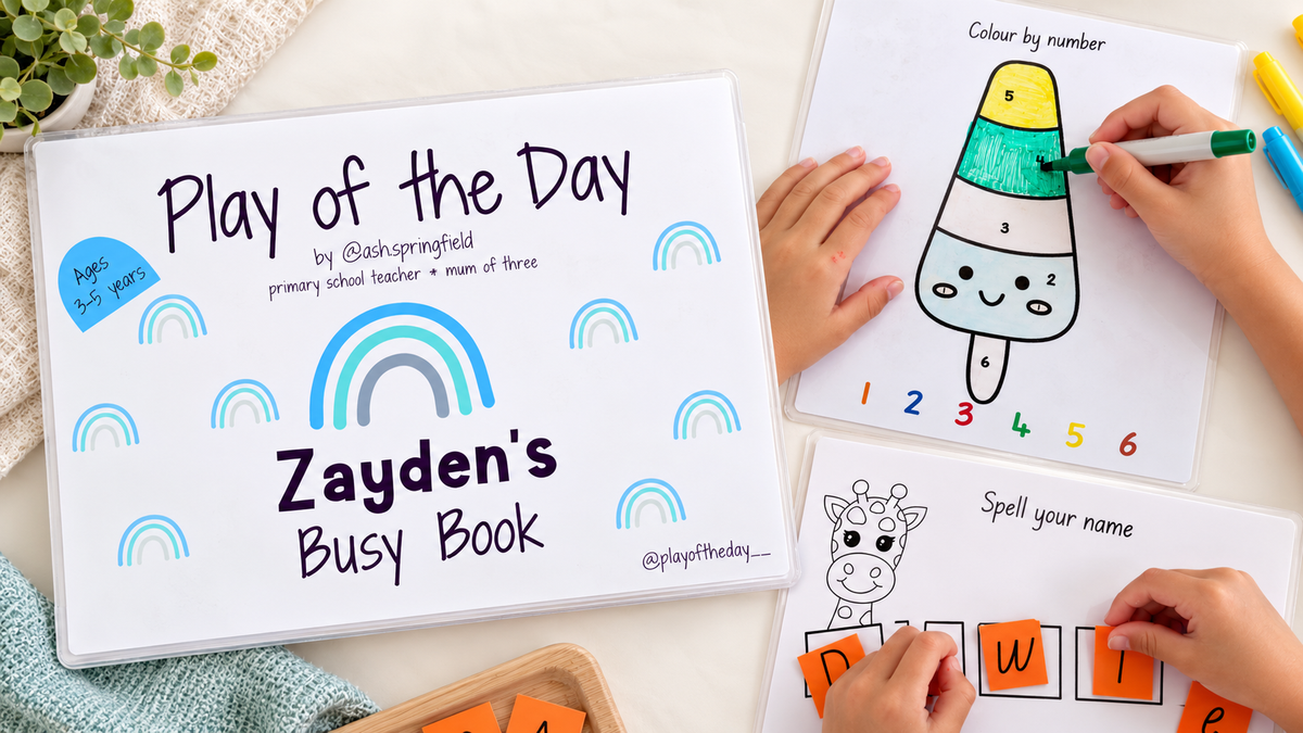 Personalised Busy Book with a child colouring a page using a whiteboard marker